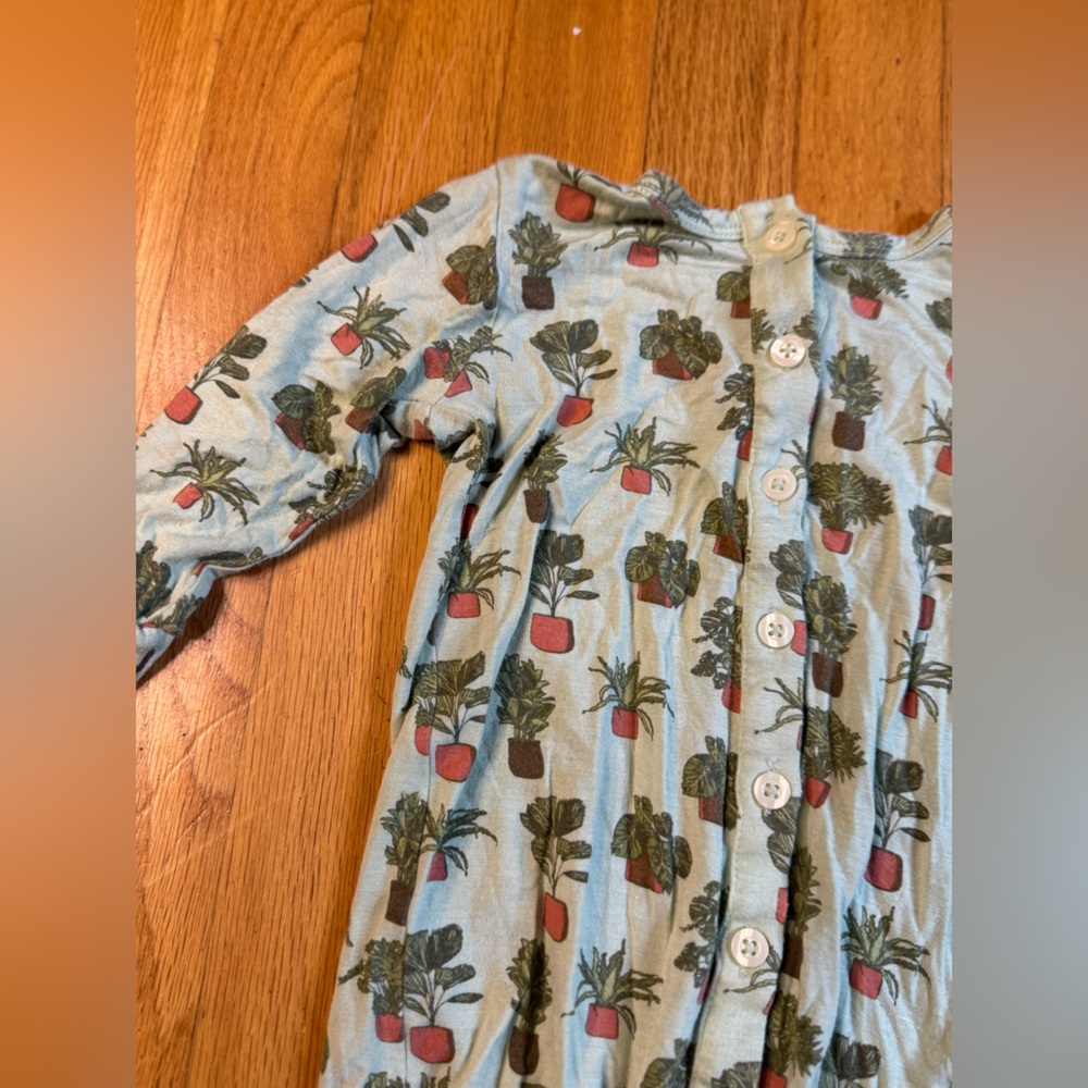 Kate Quinn Green Houseplant onesie